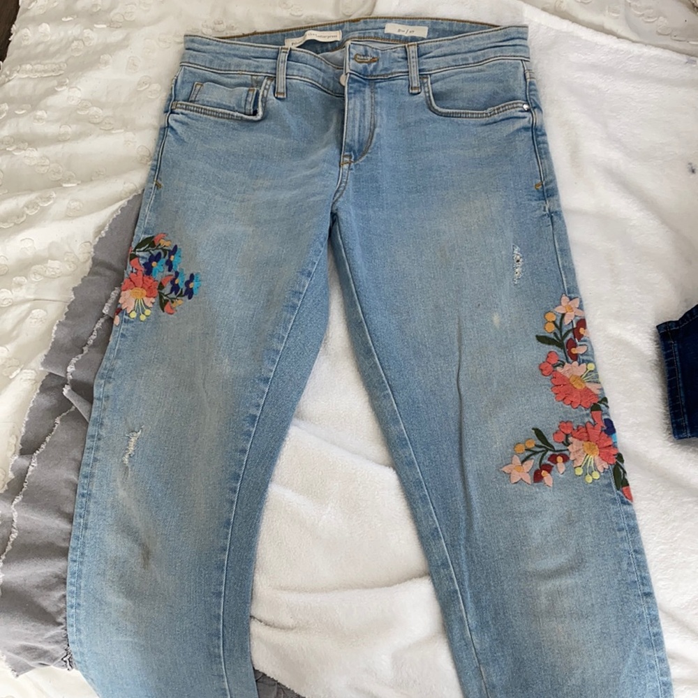 Anthropologie jeans with stitched flower design